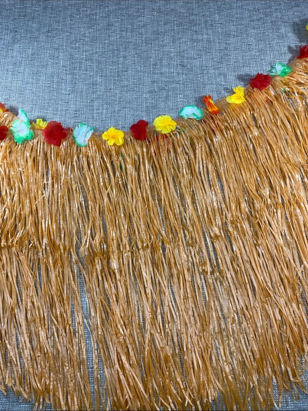 Tropical Straw Hula Skirt w Multicolor Floral Trim but really it’s made 4 table